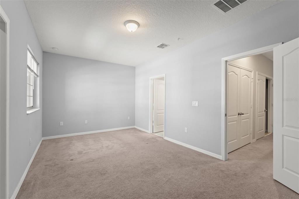 229 Rustic Loop Sanford, FL 32771 - Photo 30 of 38 an empty room with windows