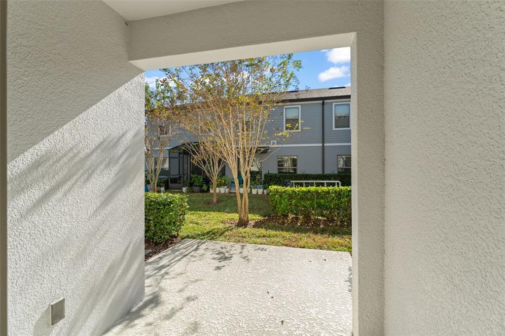 229 Rustic Loop Sanford, FL 32771 - Photo 34 of 38 a view of a house with a tree in front of it