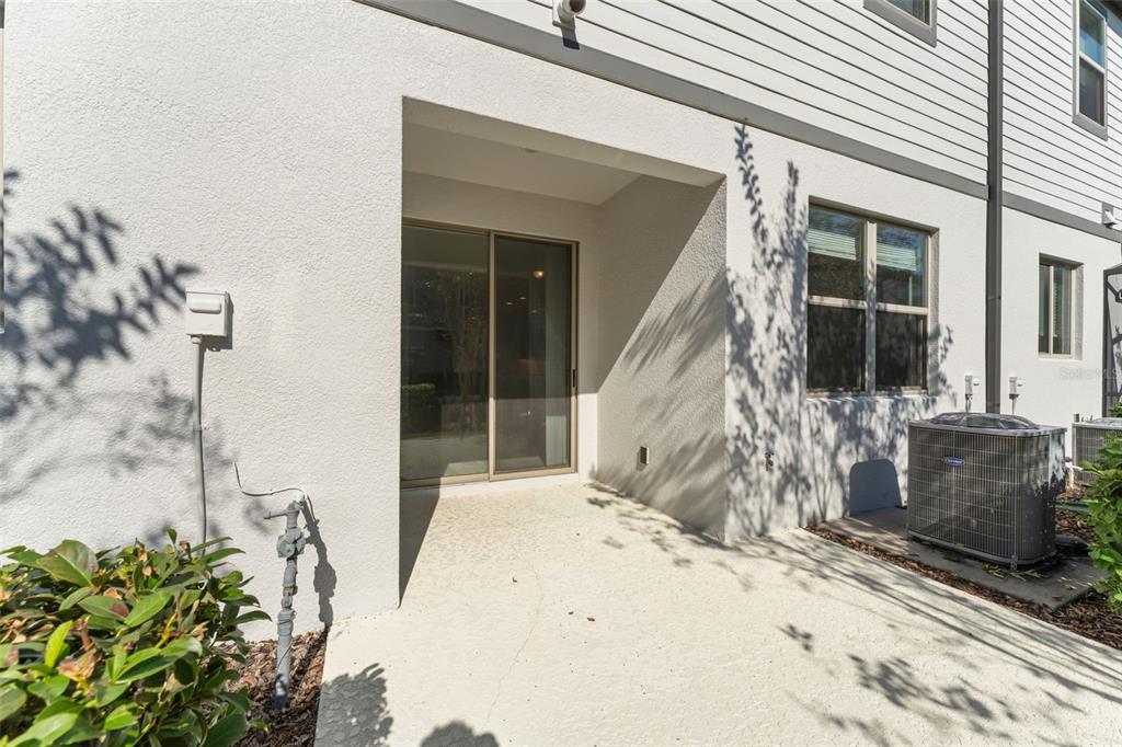 229 Rustic Loop Sanford, FL 32771 - Photo 35 of 38 a front view of a house with a yard