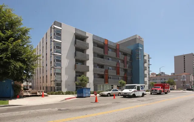 a cars parked in front of a building