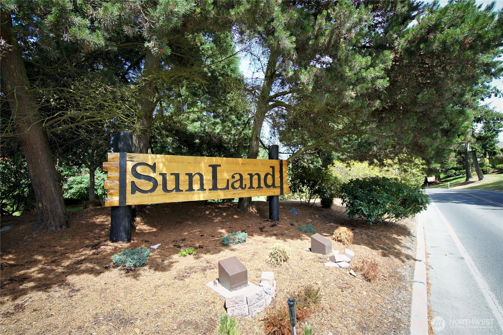 0 Vancouver Place Sequim, WA 98382 - Photo 10 of 26 a sign that is sitting in the middle of a yard