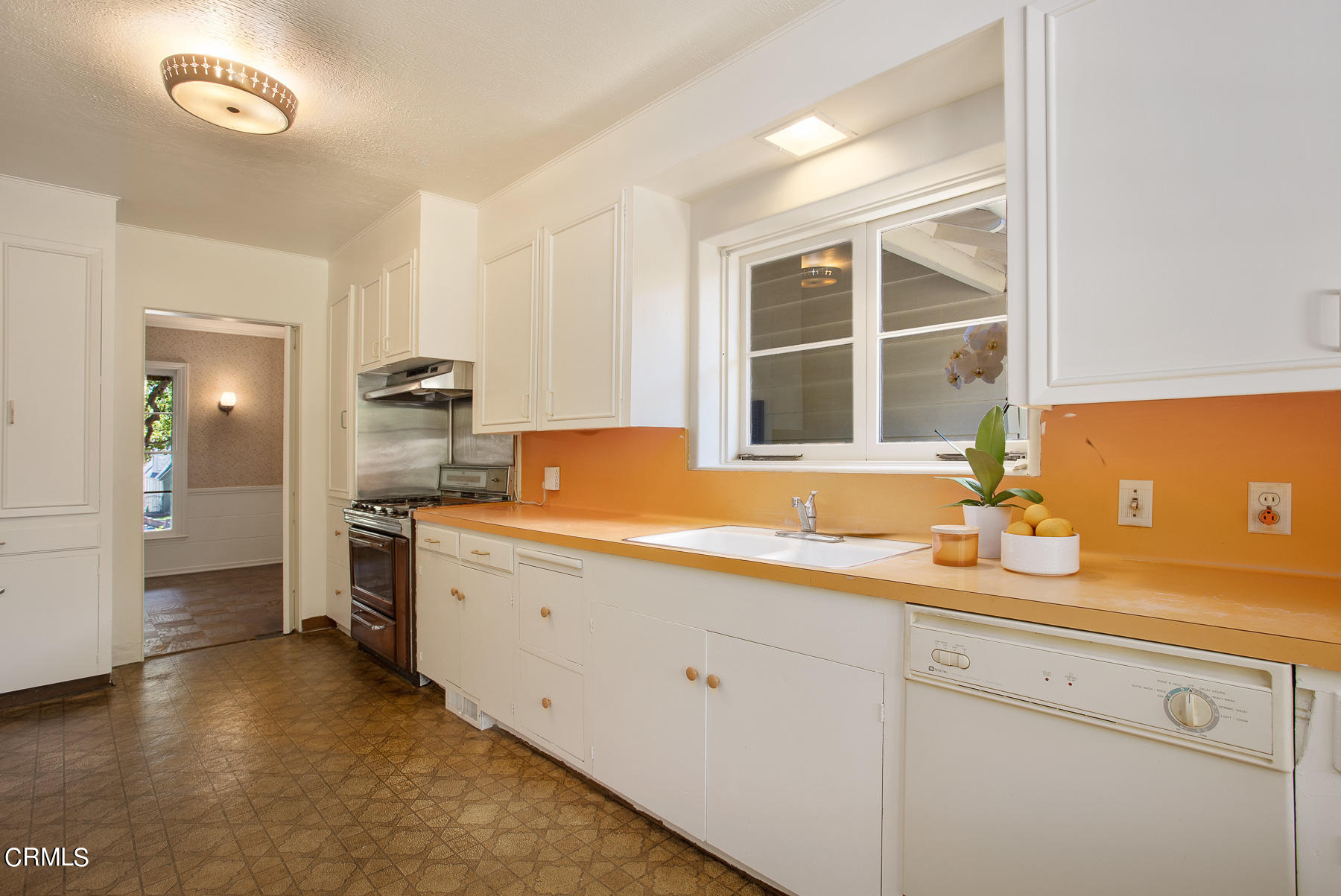 1647 Braeburn Road Altadena, CA 91001 - Photo 17 of 48 a kitchen with a sink and cabinets