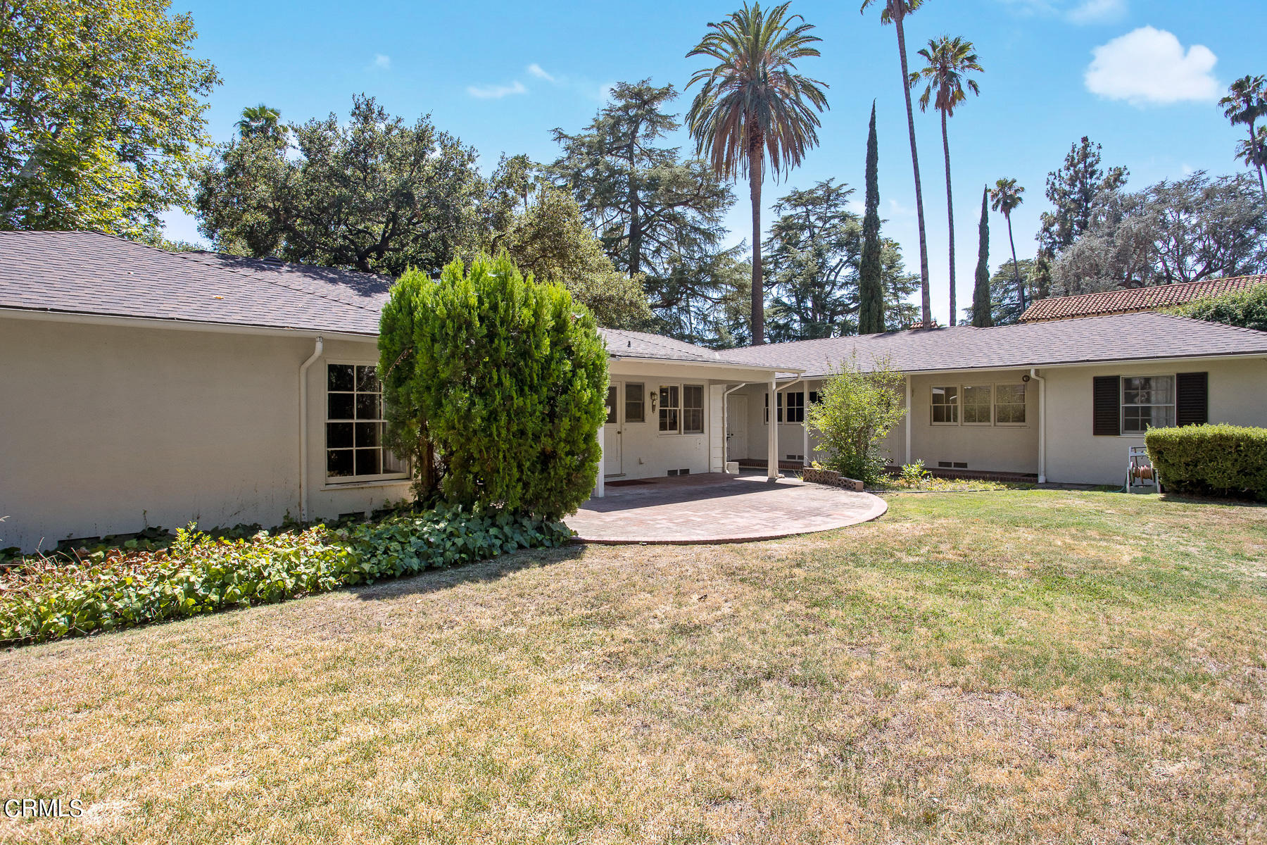 1647 Braeburn Road Altadena, CA 91001 - Photo 33 of 48 a view of a house with palm trees