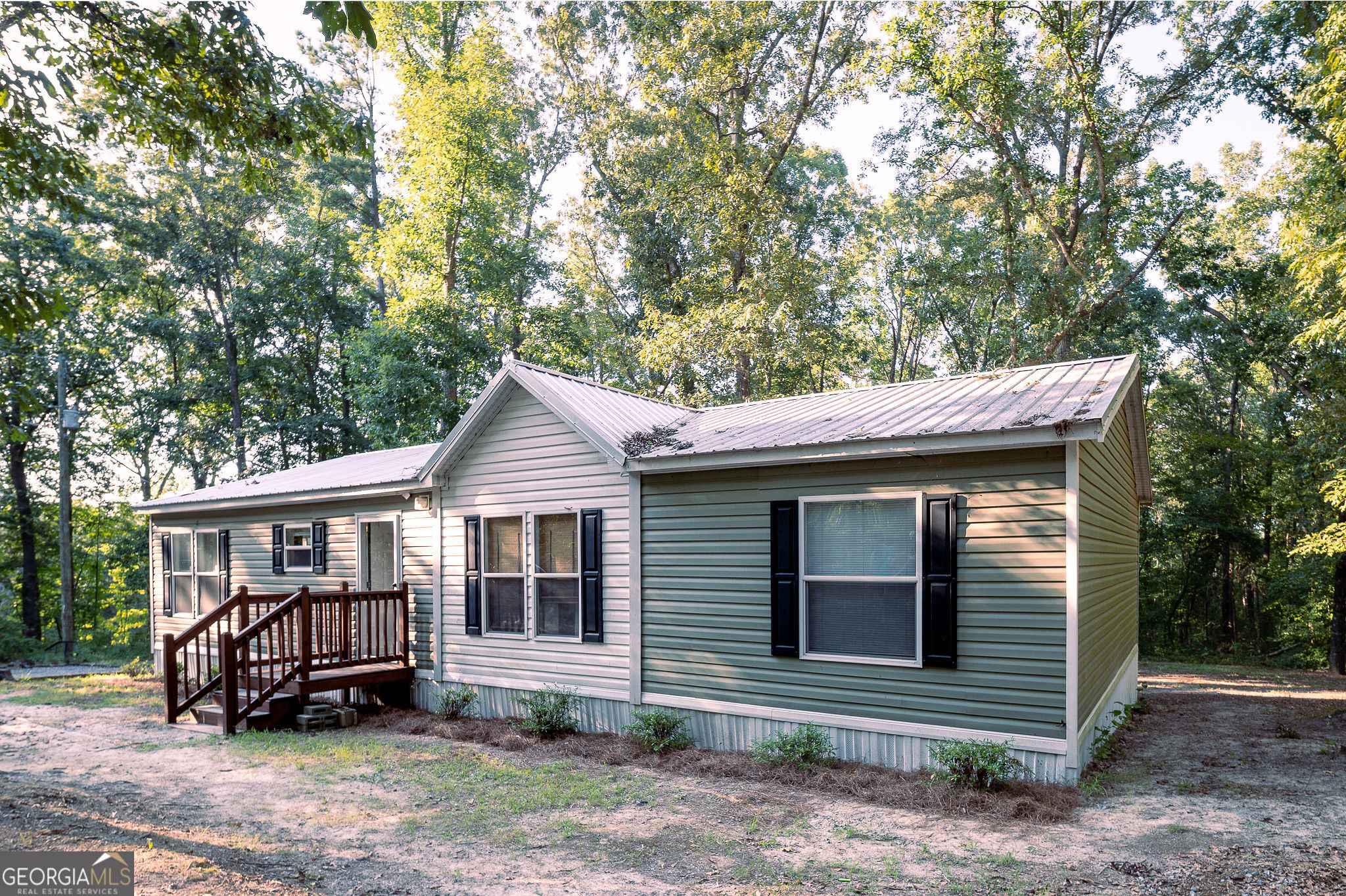 155 Morris Stevens Road Macon, GA 31217 - Photo 1 of 1 a front view of a house with a yard
