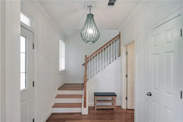 a view of entryway with wooden floor