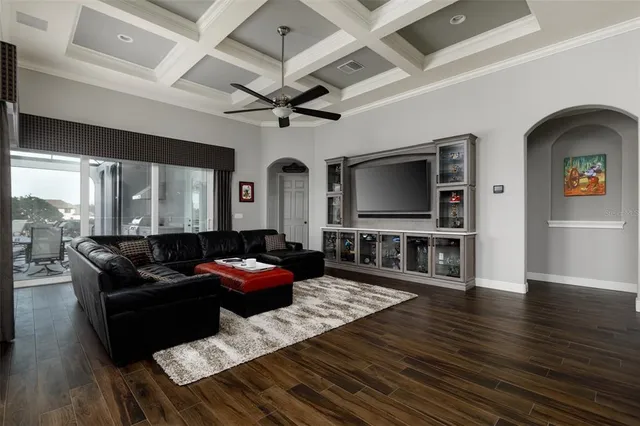 a bathroom with a sink a toilet a mirror and shower