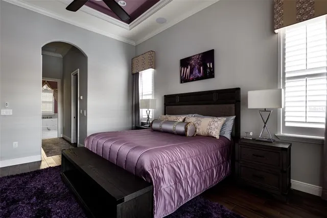 a bathroom with a toilet a sink and a mirror