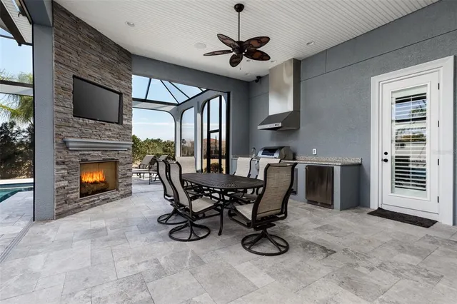 a view of a swimming pool with a outdoor seating