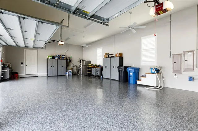 a front view of house with yard and lake