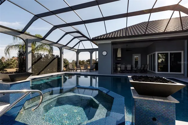 a city view with tall buildings and a yard in front of it