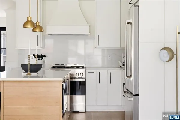 a close view of shoes stand and cabinets