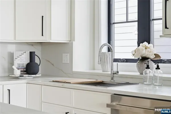 a room with a lamp and a table