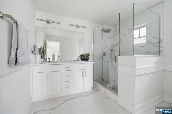 a bed room with a bed and a couch