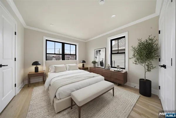 a bed room with a bed and a window