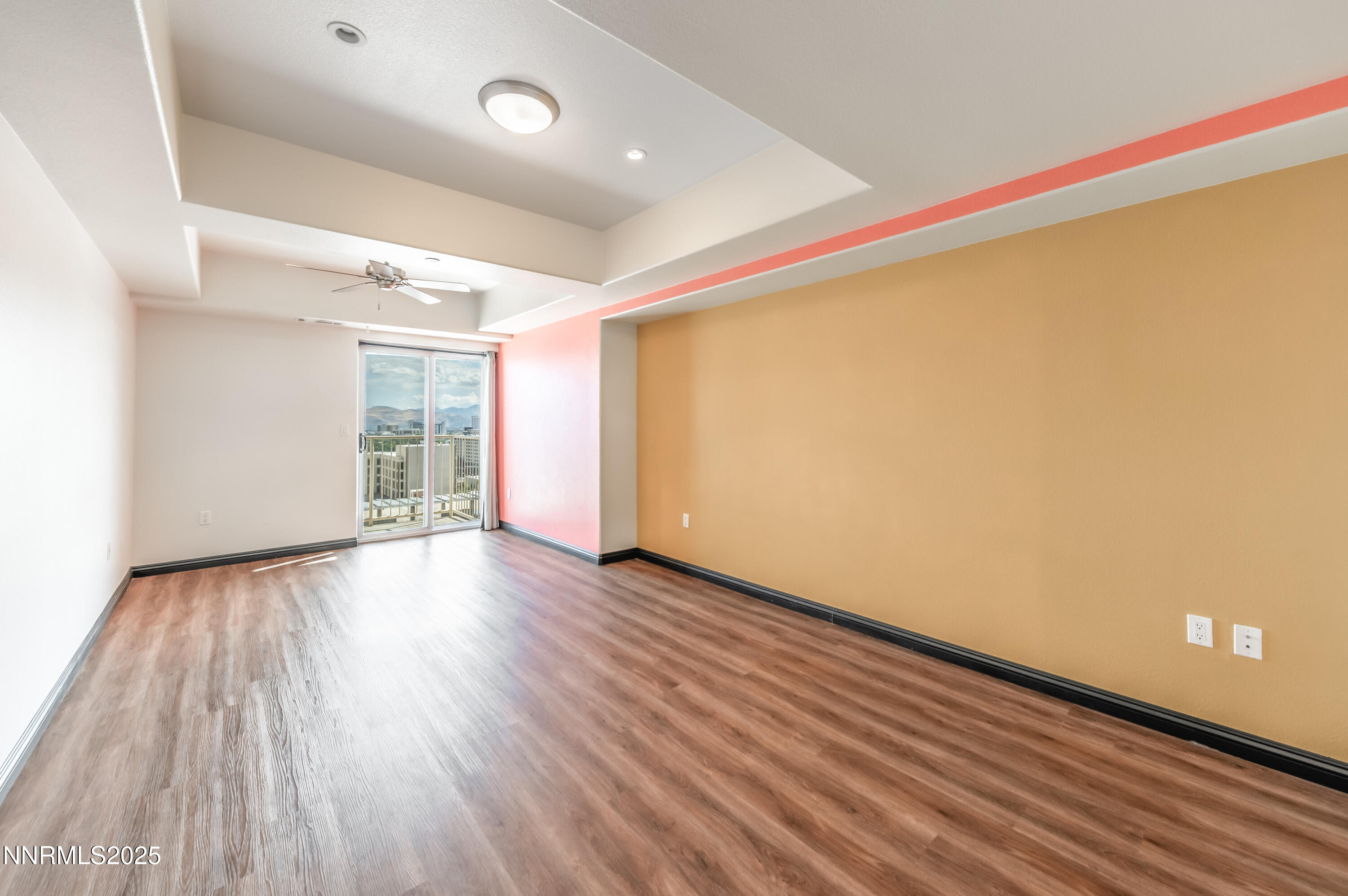 200 West 2nd Street, Unit 1101 Reno, NV 89501 - Photo 13 of 38 a view of an empty room with wooden floor and a window
