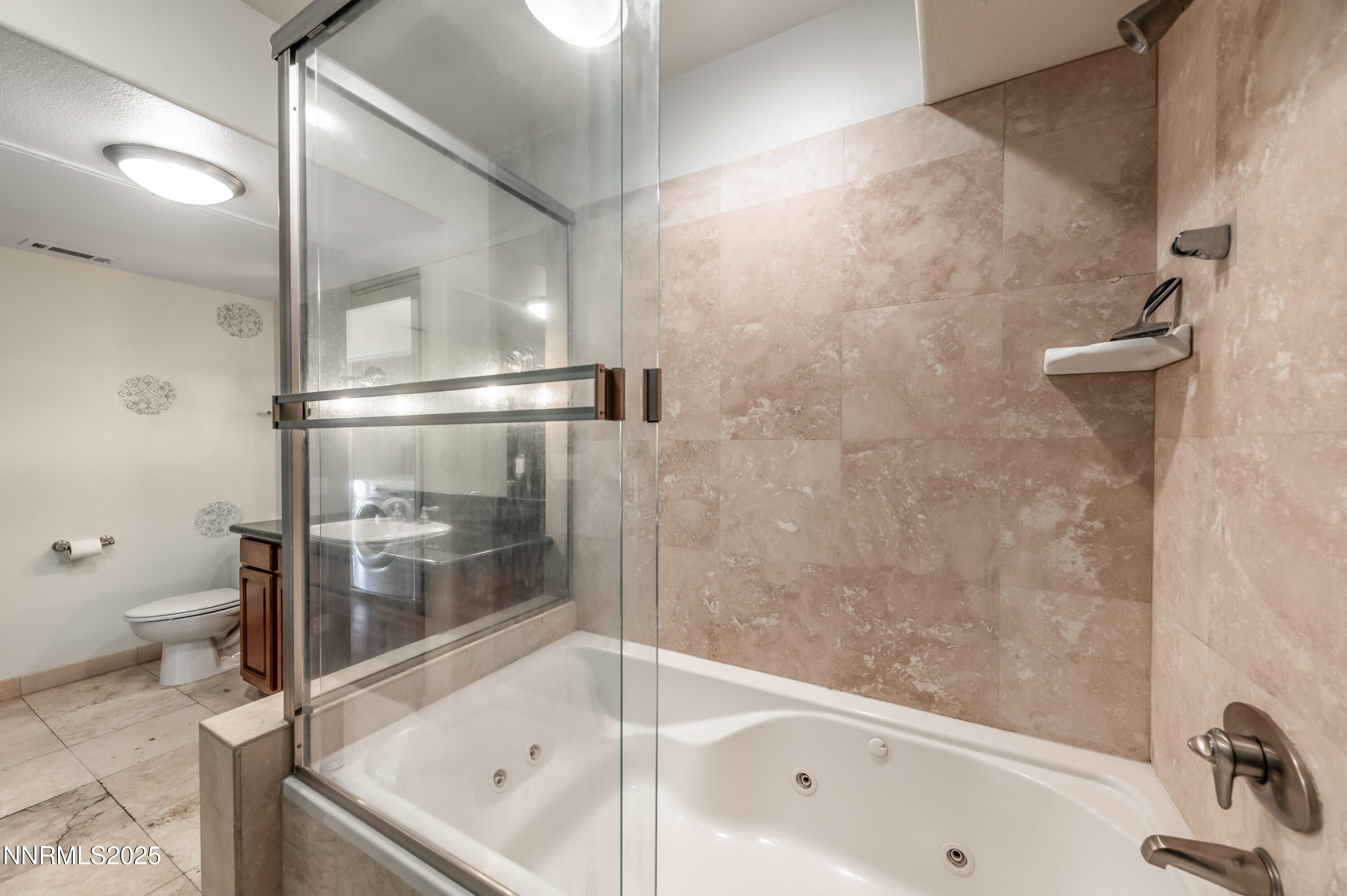 200 West 2nd Street, Unit 1101 Reno, NV 89501 - Photo 21 of 38 a bathroom with a bathtub and a toilet