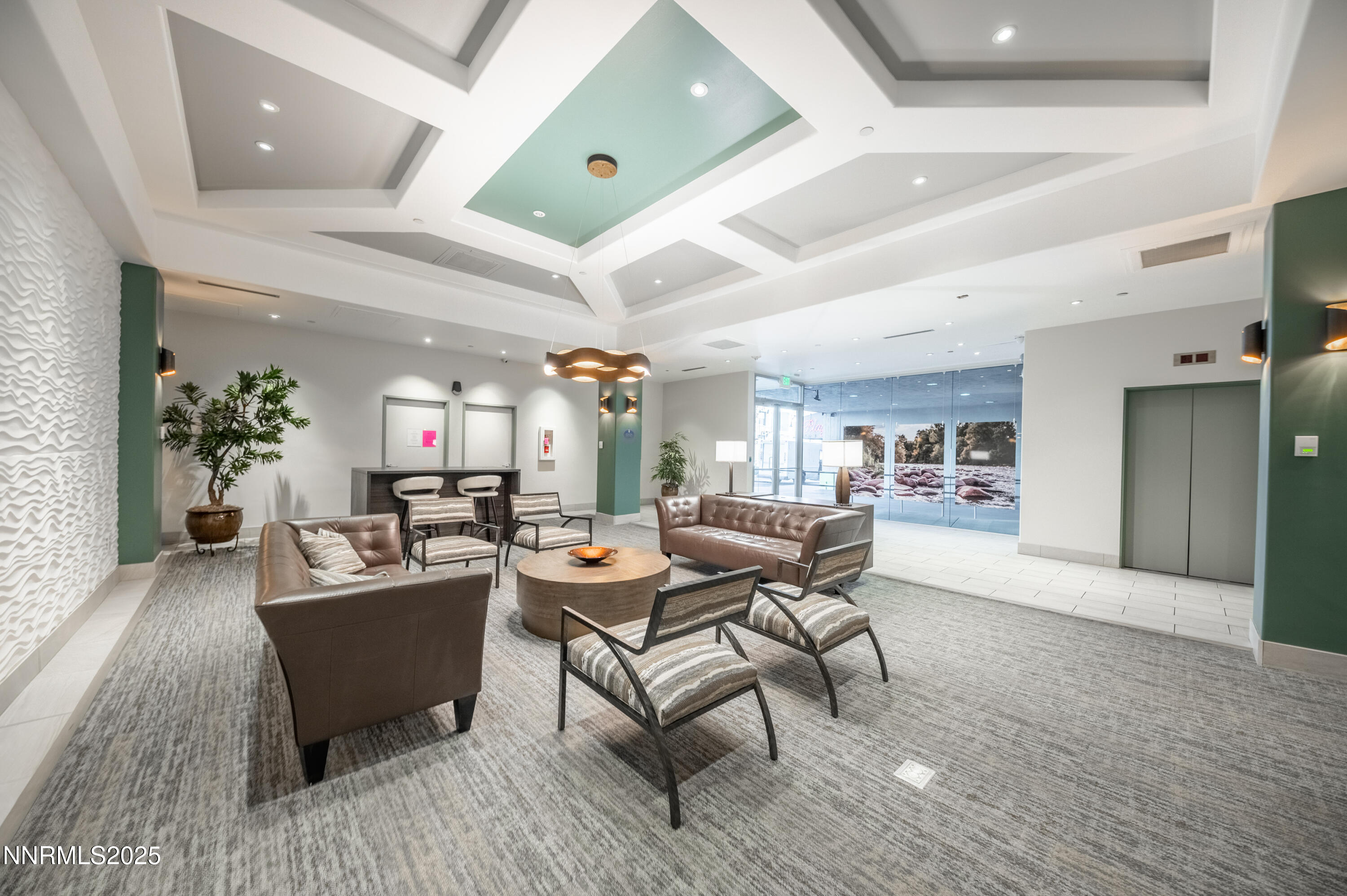 200 West 2nd Street, Unit 1101 Reno, NV 89501 - Photo 27 of 38 a living room with furniture and a wooden floor