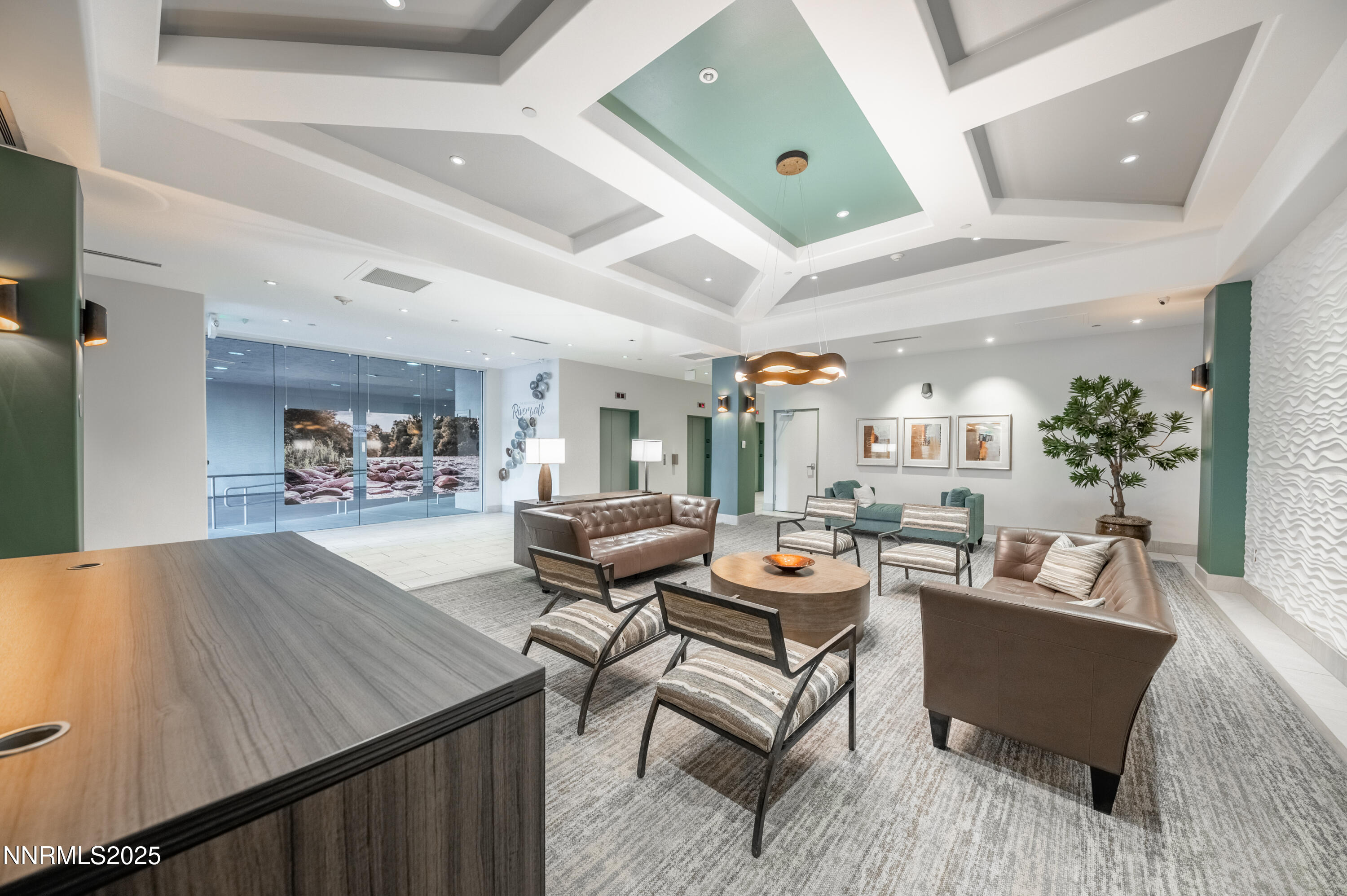 200 West 2nd Street, Unit 1101 Reno, NV 89501 - Photo 28 of 38 a living room with furniture and a flat screen tv