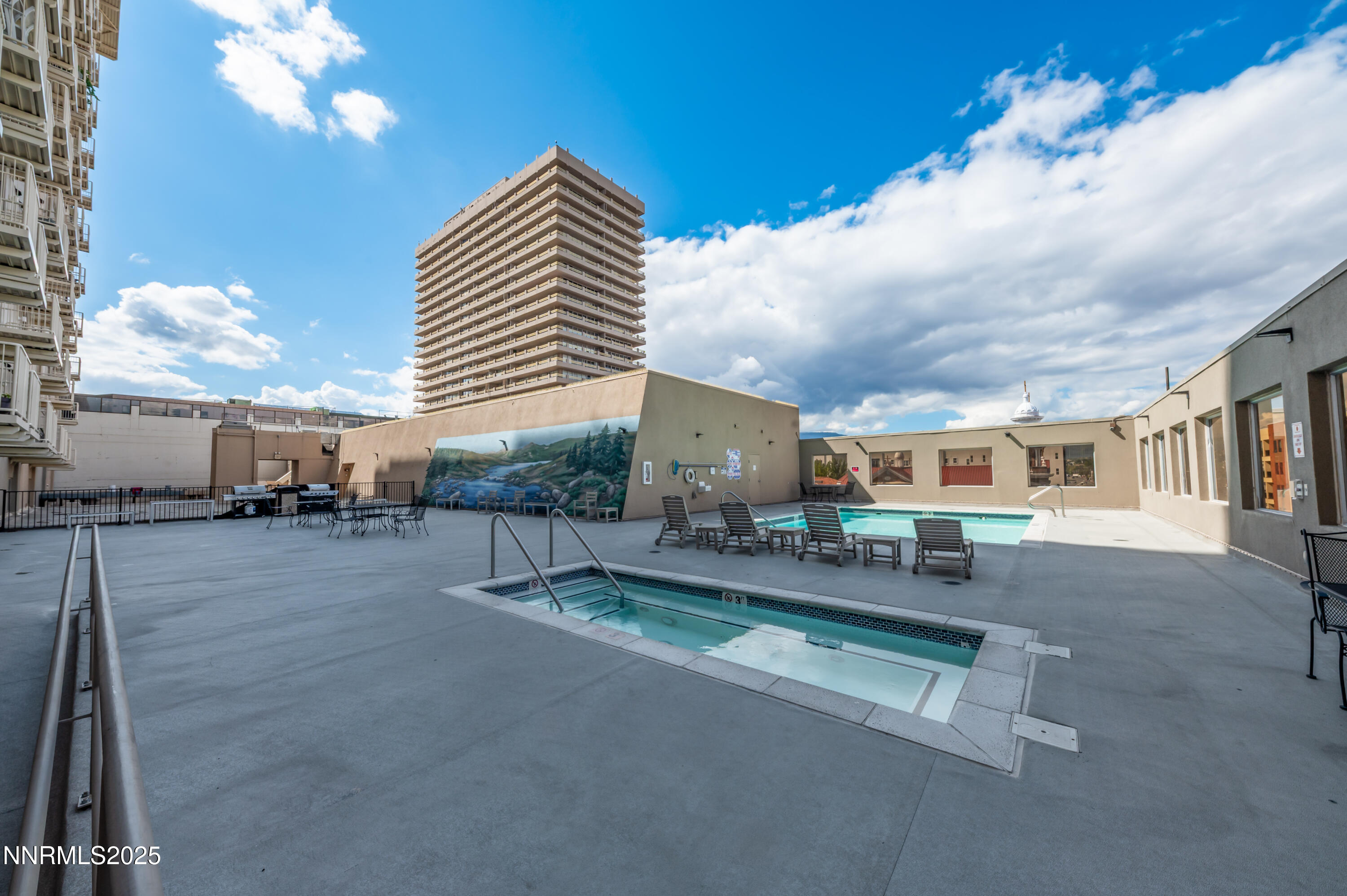 200 West 2nd Street, Unit 1101 Reno, NV 89501 - Photo 29 of 38 a living room with furniture and a large window
