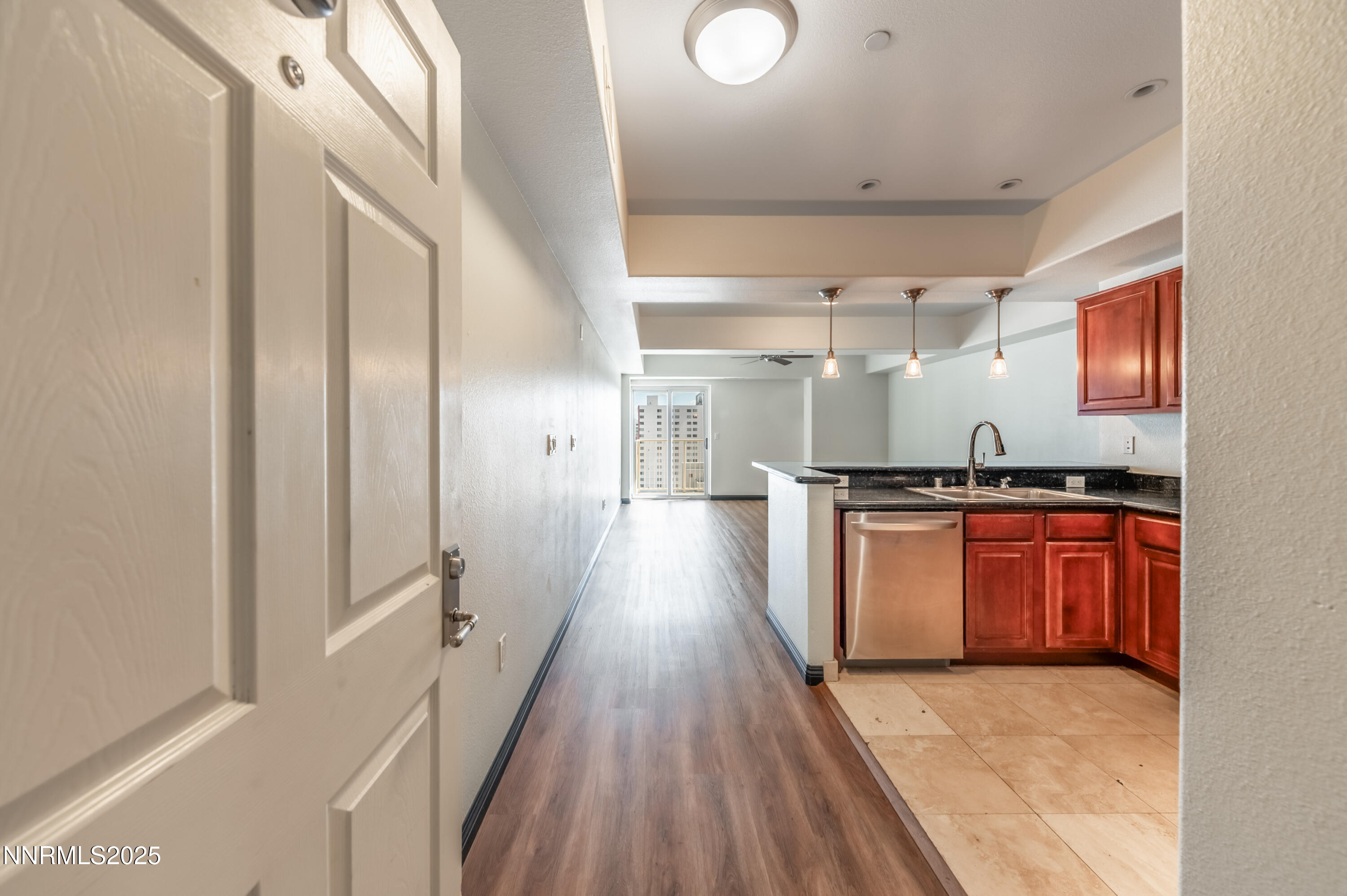 200 West 2nd Street, Unit 1101 Reno, NV 89501 - Photo 3 of 38 a view of hallway with wooden floor