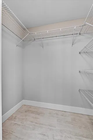 a view of a room with racks on the wall