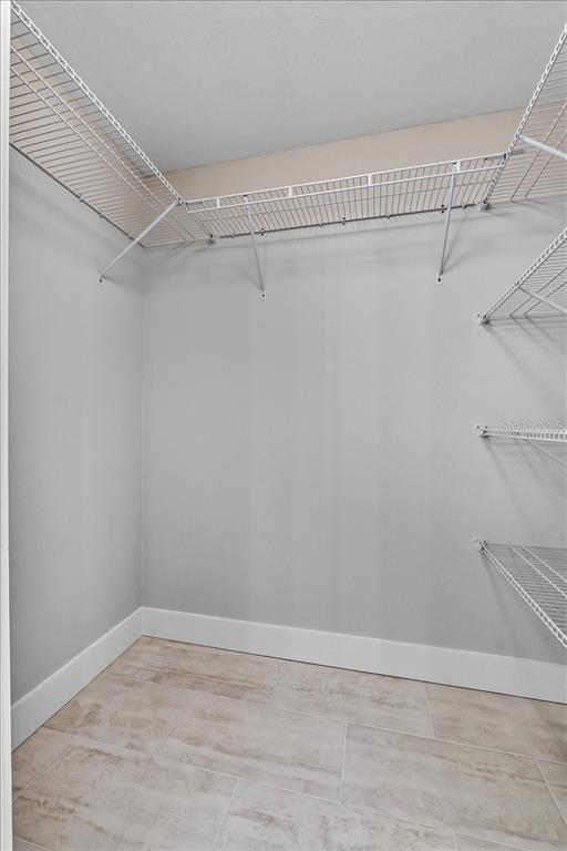 718 Canberra Road Winter Haven, FL 33884 - Photo 15 of 36 a view of a room with racks on the wall