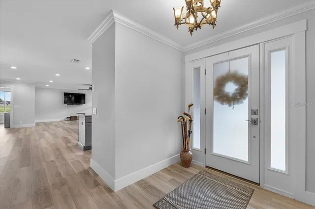 a view of a hallway view with staircase