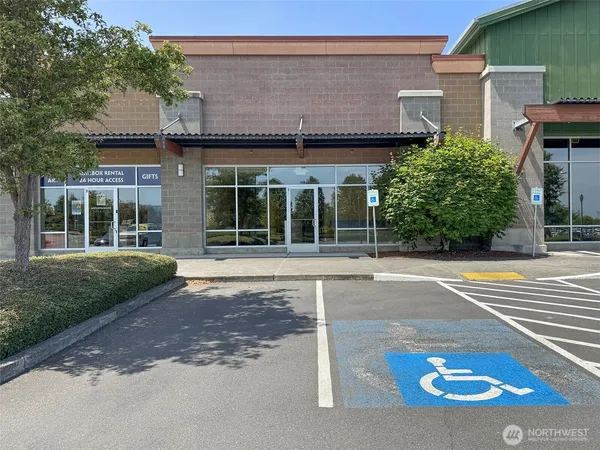 a view of a brick house with a large windows
