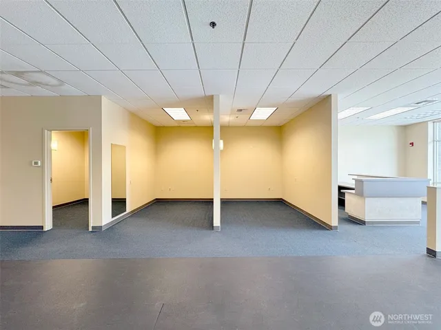 an empty room with windows