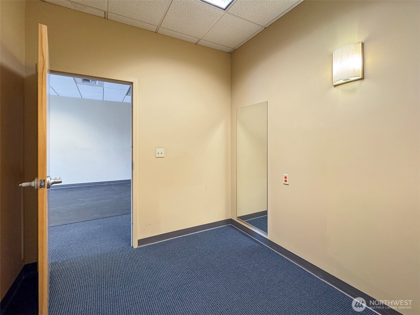 1400 West Washington Street, Unit 102 Sequim, WA 98382 - Photo 16 of 35 an empty room with windows
