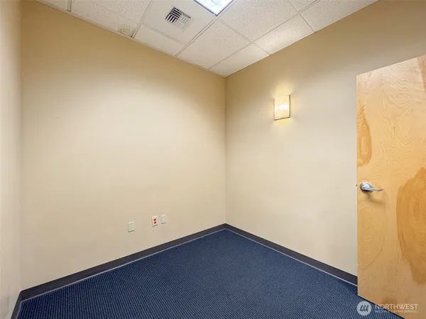 a view of a kitchen with a sink and dishwasher