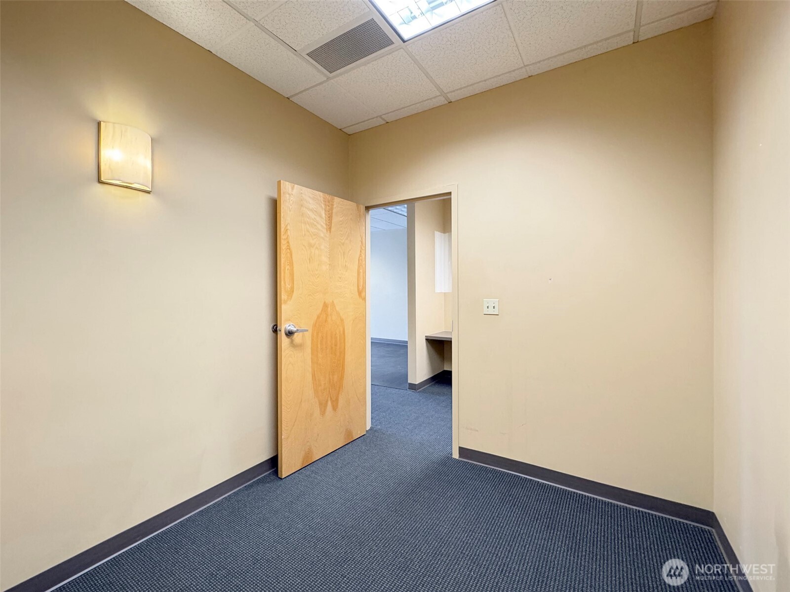 1400 West Washington Street, Unit 102 Sequim, WA 98382 - Photo 22 of 35 an empty room with a bathroom