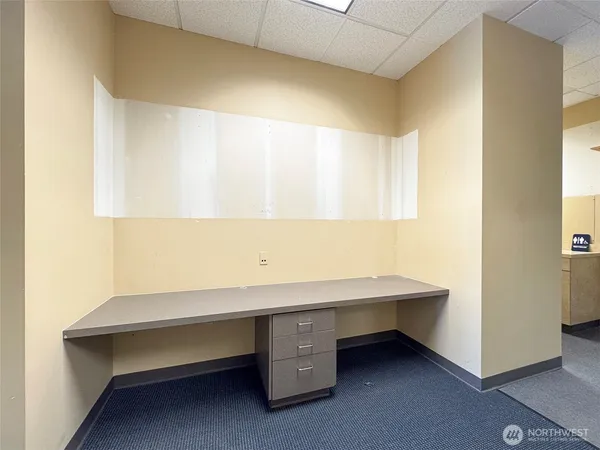 a bathroom with a toilet and a sink