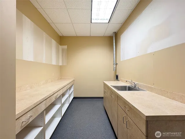 a front view of a house with garage