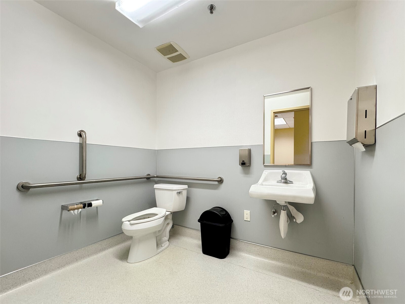 1400 West Washington Street, Unit 102 Sequim, WA 98382 - Photo 27 of 35 a bathroom with a toilet and a sink