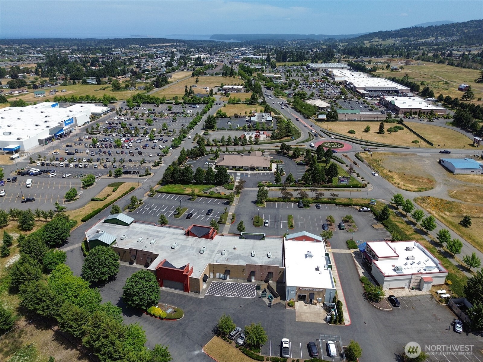 1400 West Washington Street, Unit 102 Sequim, WA 98382 - Photo 35 of 35 an aerial view of a city