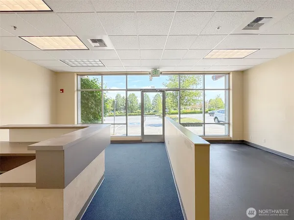a view of a livingroom with a staircase
