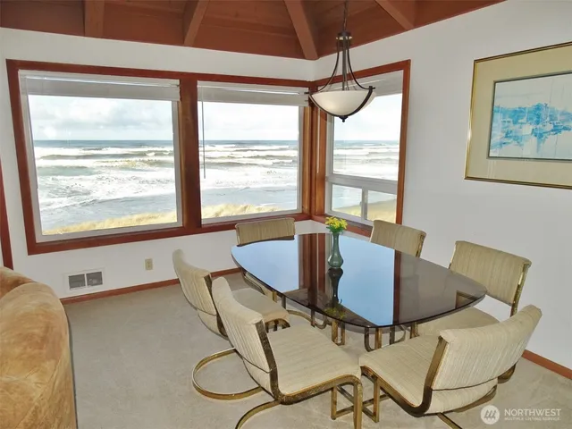 a view of room with window and front door