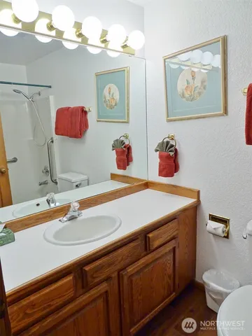 a view of a balcony with wooden floor