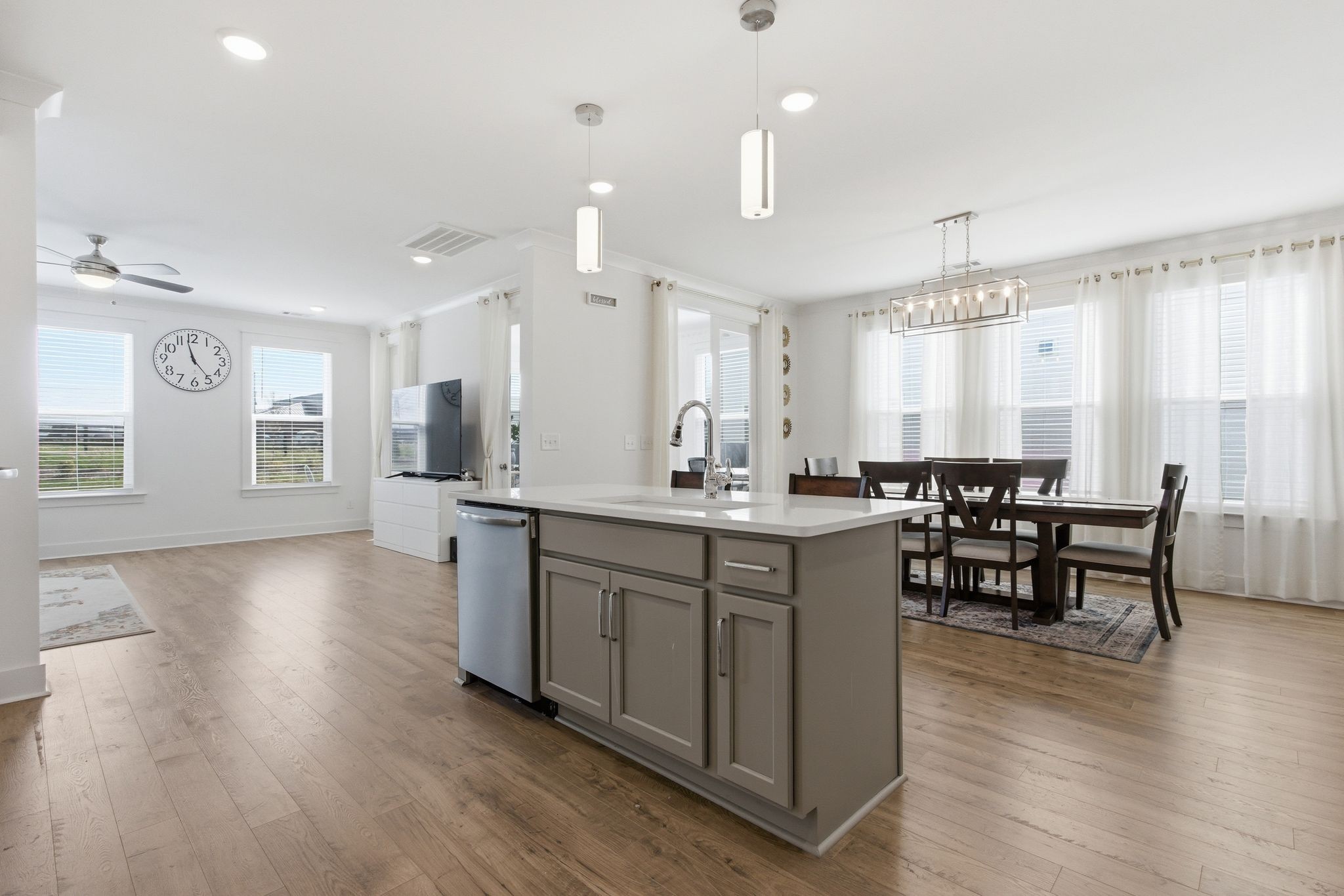 688 Conifer Drive Spring Hill, TN 37174 - Photo 13 of 40 a large kitchen with kitchen island a sink table and chairs