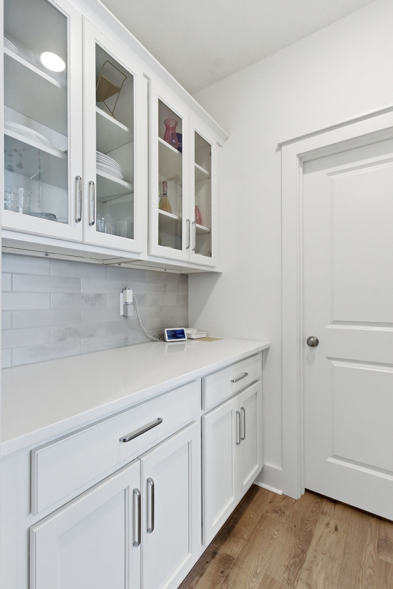 688 Conifer Drive Spring Hill, TN 37174 - Photo 16 of 40 a view of cabinets a sink and a window in a room