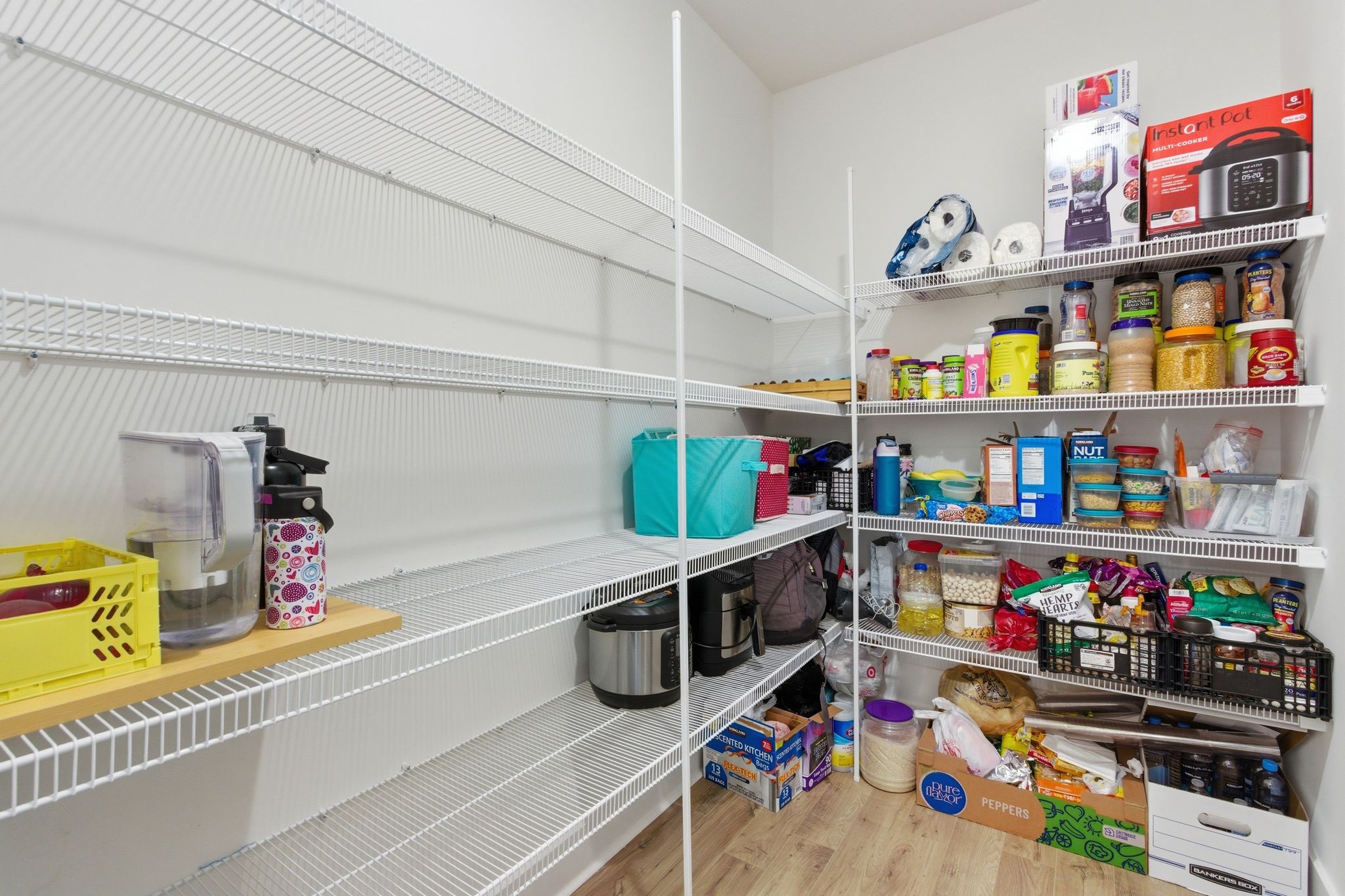 688 Conifer Drive Spring Hill, TN 37174 - Photo 17 of 40 a storage room with lots of clutter and toys