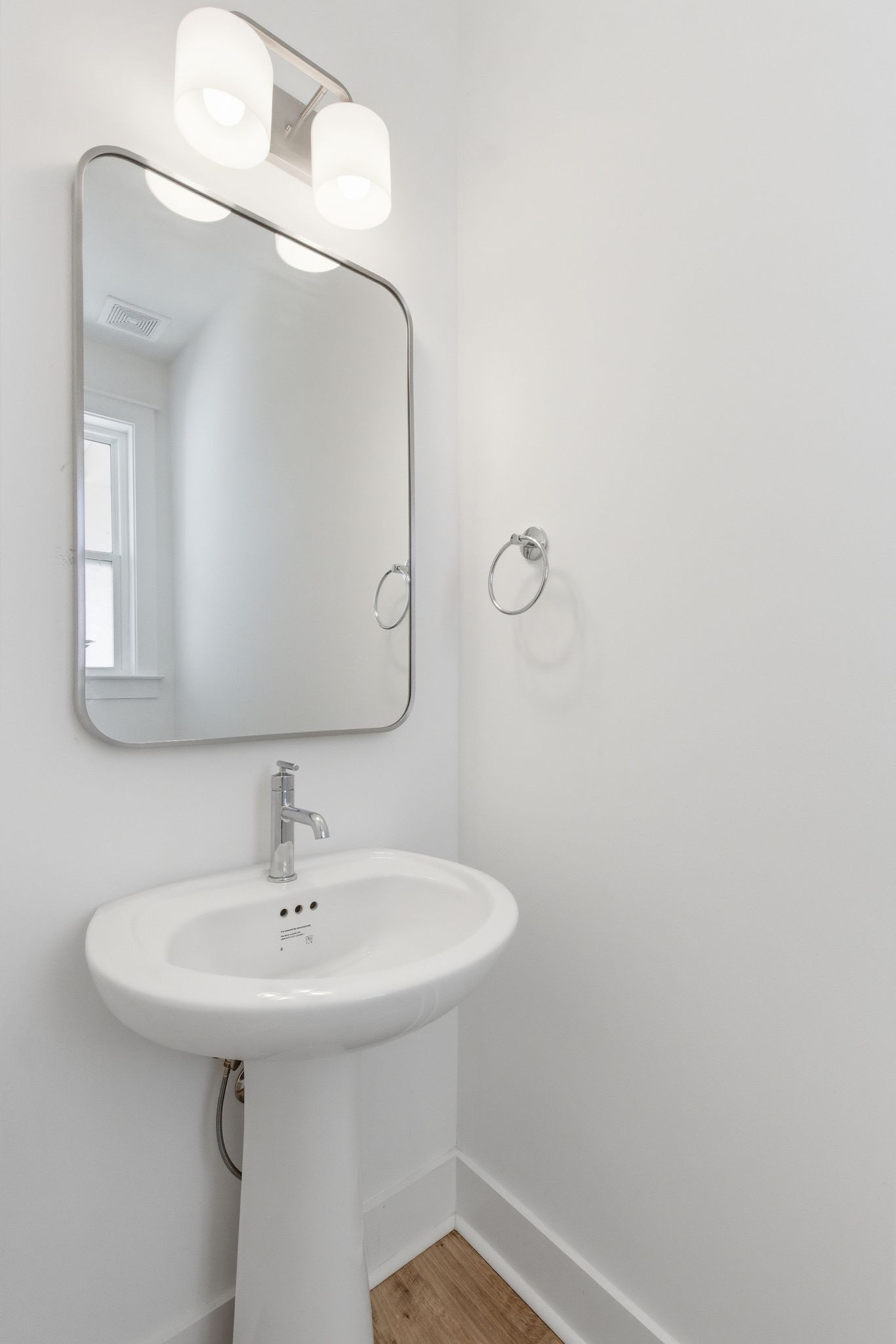 688 Conifer Drive Spring Hill, TN 37174 - Photo 19 of 40 a bathroom with a sink and a mirror