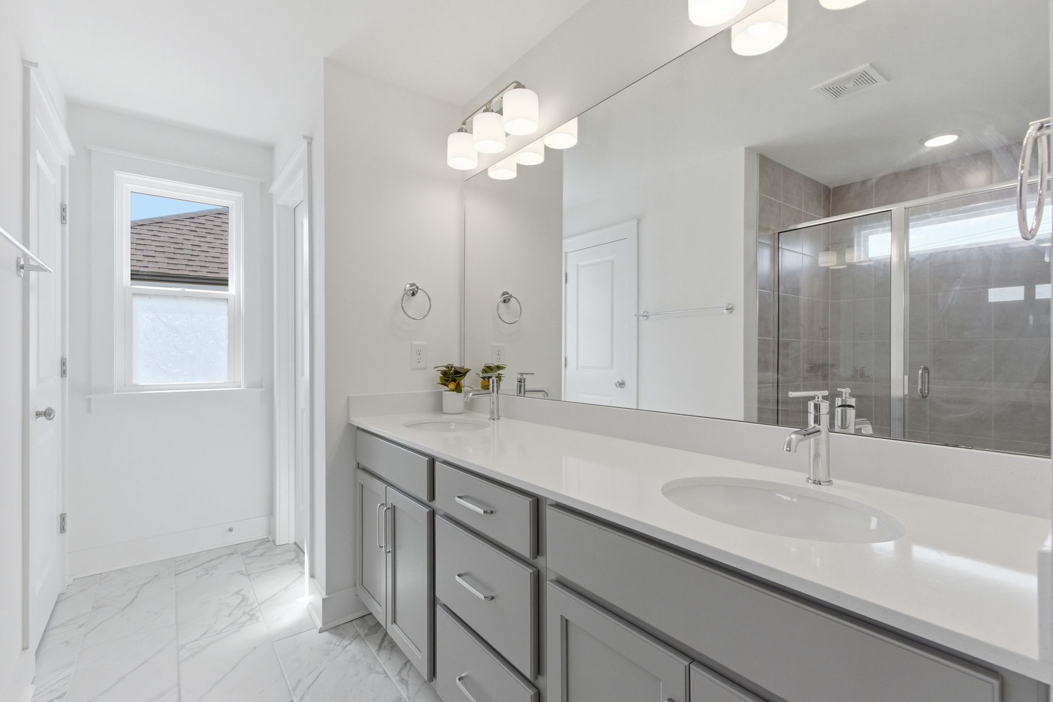 688 Conifer Drive Spring Hill, TN 37174 - Photo 23 of 40 a bathroom with a sink double vanity and a mirror
