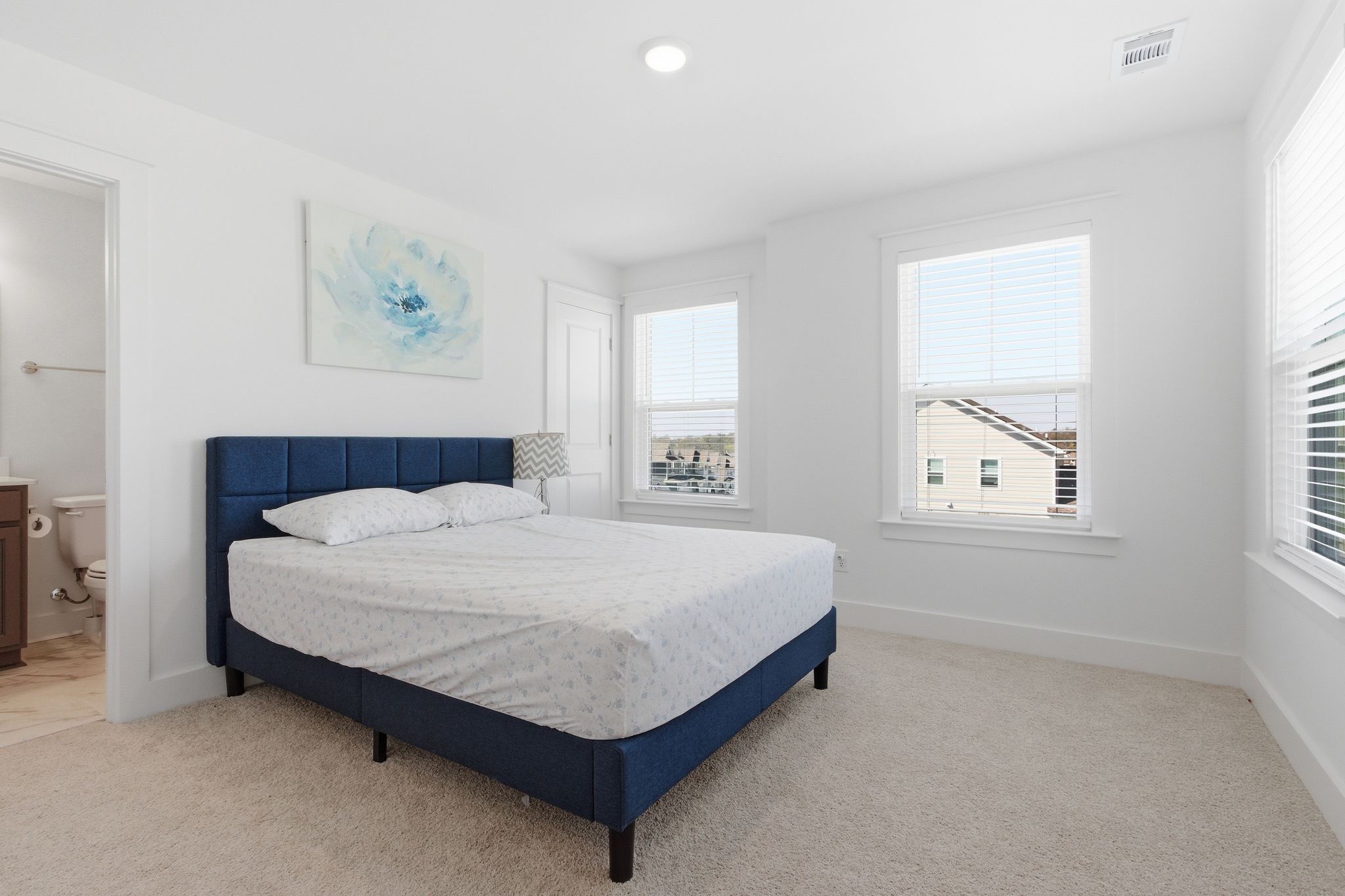 688 Conifer Drive Spring Hill, TN 37174 - Photo 29 of 40 a bed sitting in a bedroom next to a window