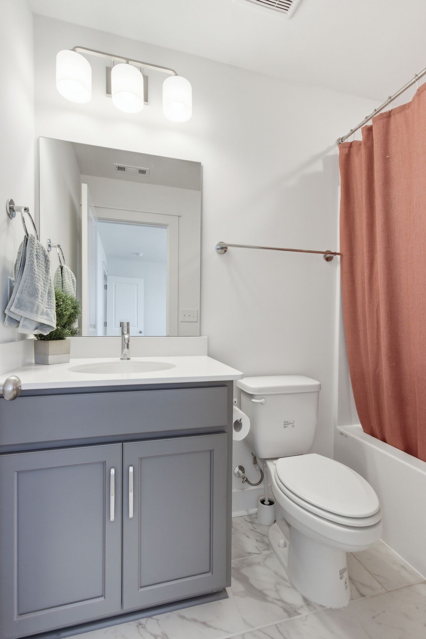 688 Conifer Drive Spring Hill, TN 37174 - Photo 31 of 40 a bathroom with a sink a toilet and shower