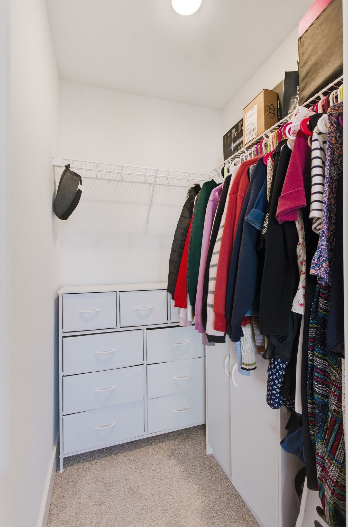 688 Conifer Drive Spring Hill, TN 37174 - Photo 35 of 40 a view of walk in closet with clothes and shoes