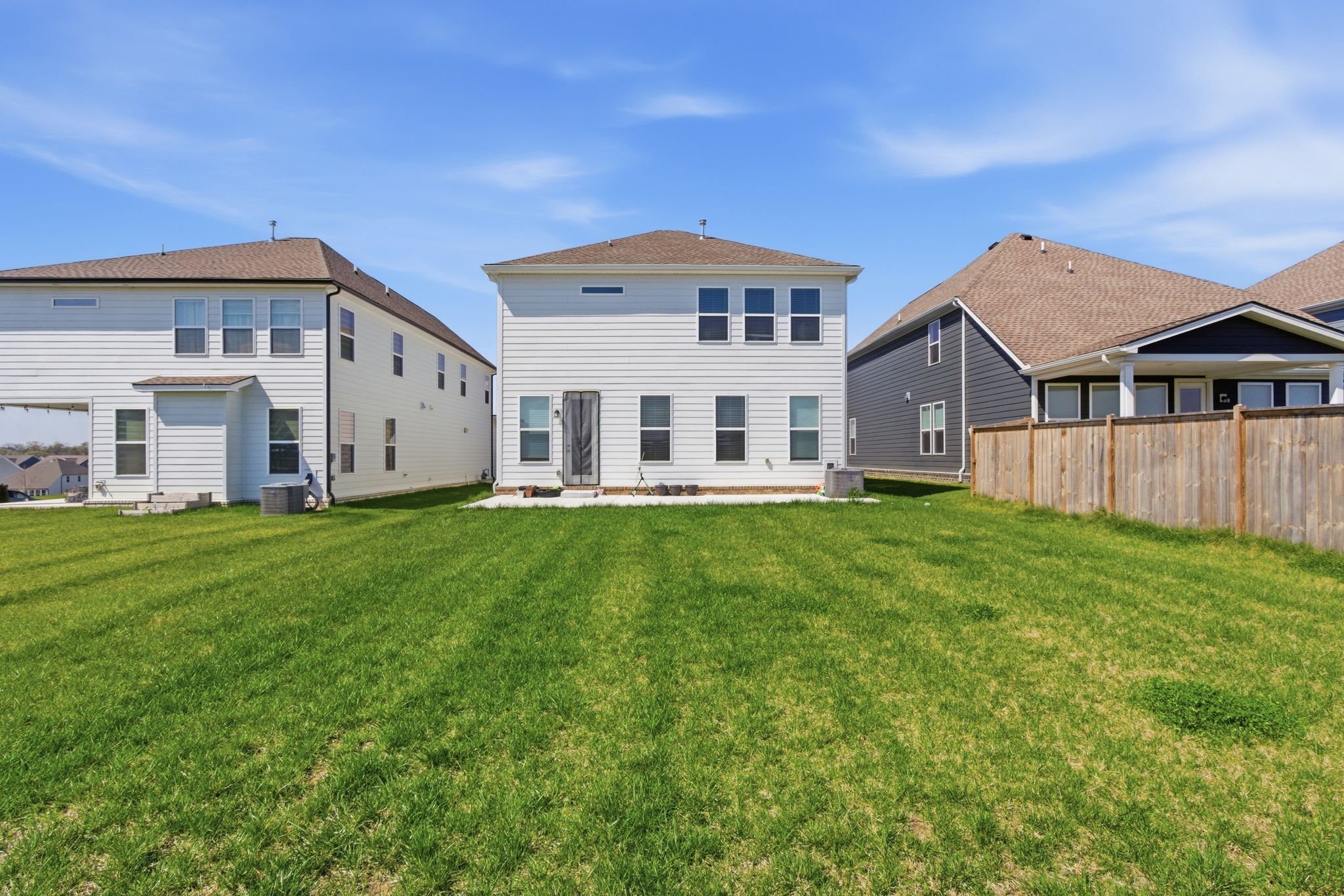 688 Conifer Drive Spring Hill, TN 37174 - Photo 38 of 40 a view of a house with a big yard and large tree