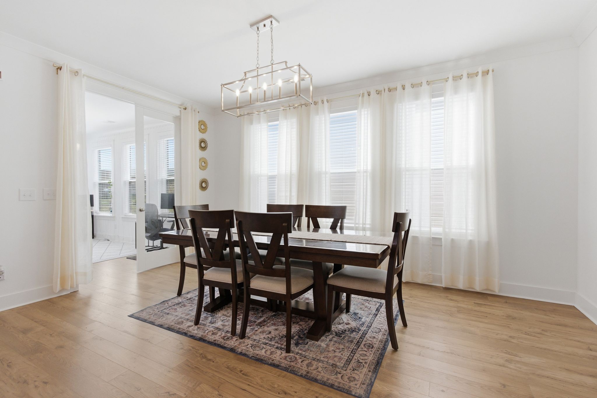 688 Conifer Drive Spring Hill, TN 37174 - Photo 8 of 40 a view of a dining room with furniture and chandelier
