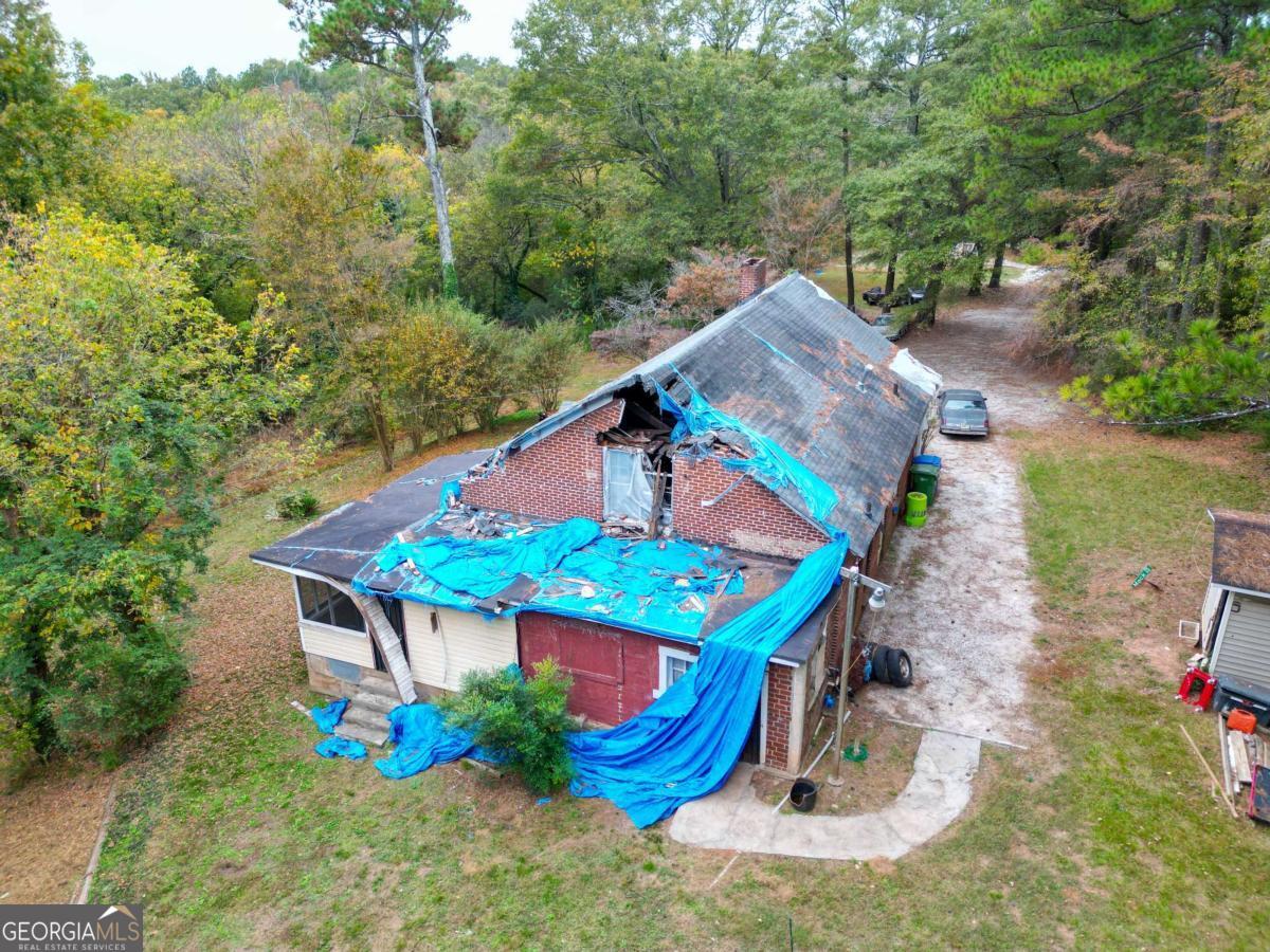 1345 Gun Club Road Northwest Atlanta, GA 30318 - Photo 6 of 12 an aerial view of a house with outdoor space